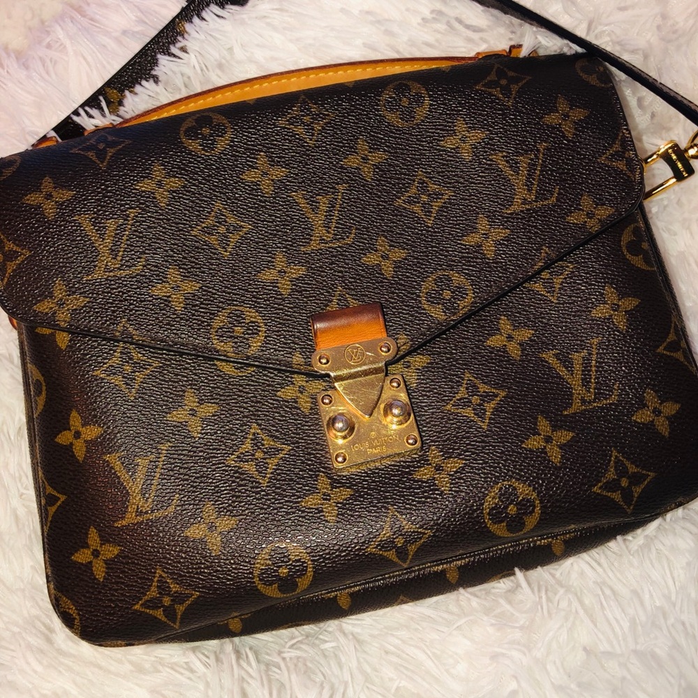 Pochette Métis Monogram